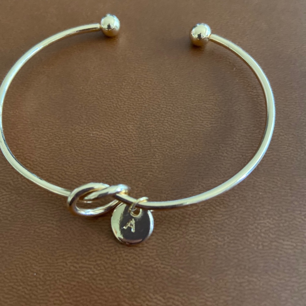 Knotted “A” bracelet